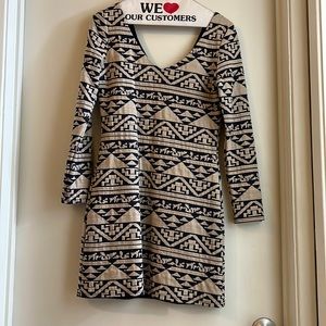 Geometric pattern dress, tight fitting.